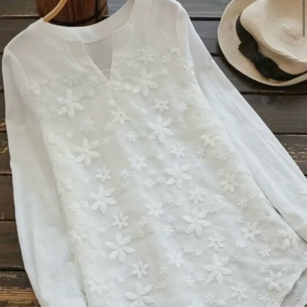Very pretty lace look top. It is tagged as xxl would fit a 14   Never worn